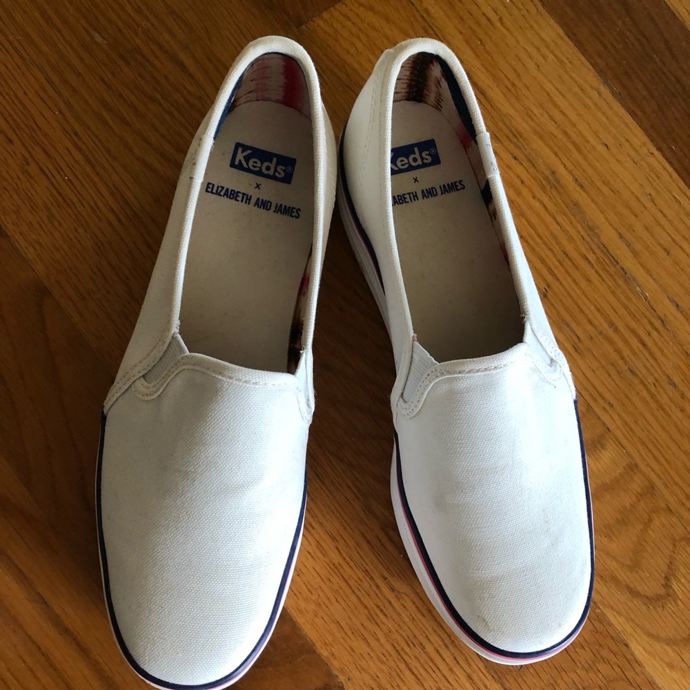 Kids slip on white platform sneakers